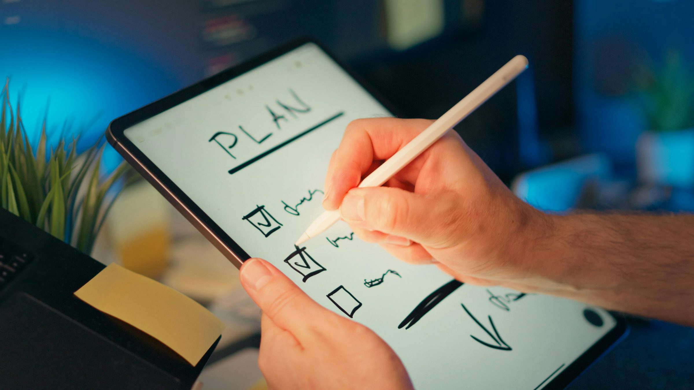 Image of someone making a plan on a whiteboard